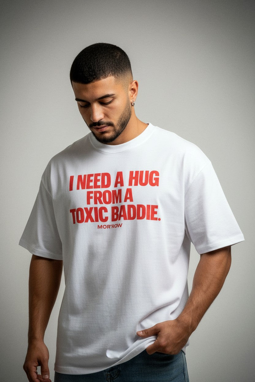 I NEED A HUG FROM A TOXIC BADDIE. - Organic Oversize Shirt